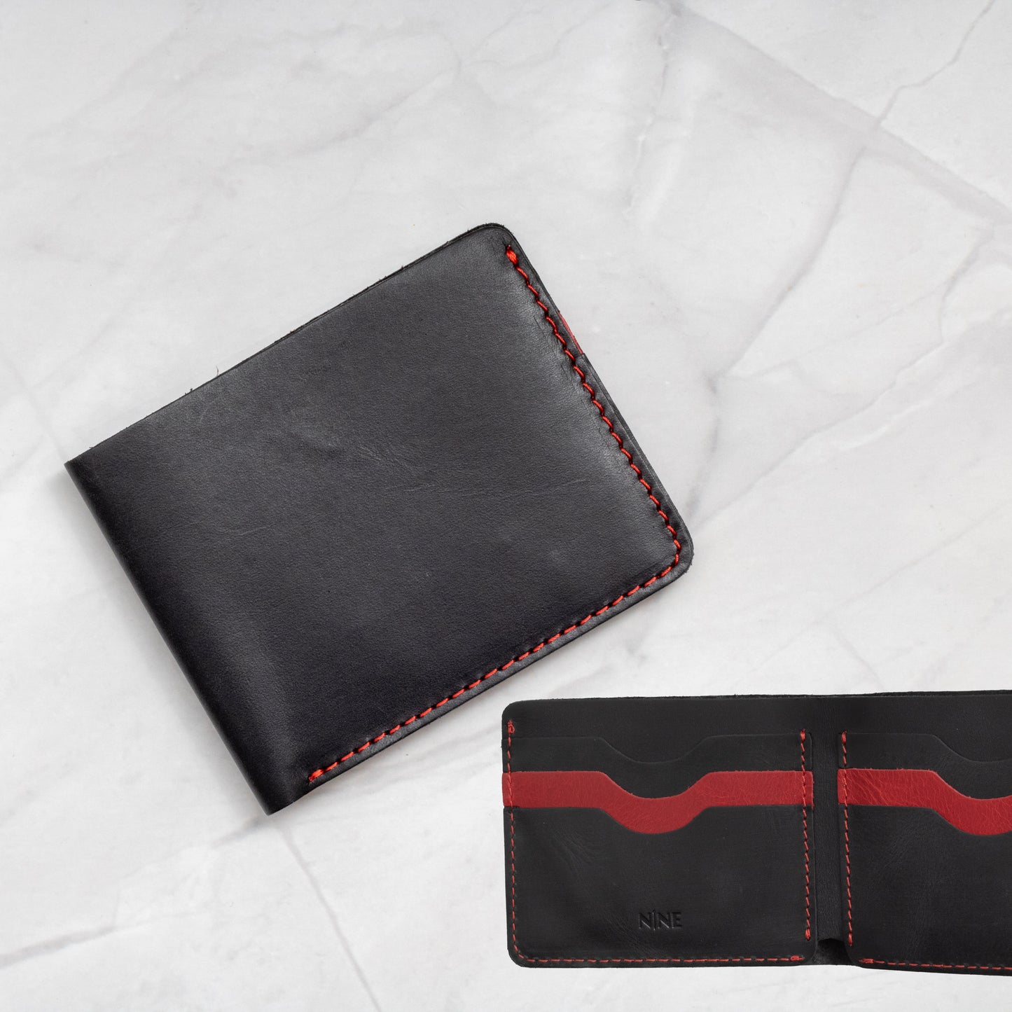 Black and Red two-tone Full-Grain Leather Classic Bifold Wallet with a slim profile and 6 card slots.