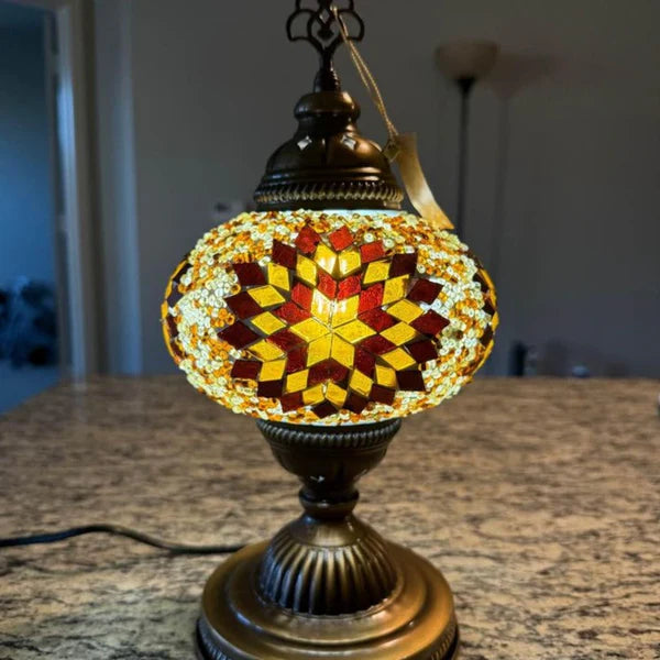 Large Turkish Mosaic Lamp illuminating a living room with warm, colorful patterns
