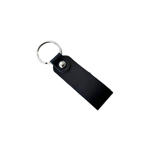 Handcrafted black leather keychain with metal ring and snap closure, made in the USA by Nine Leather & Watch.