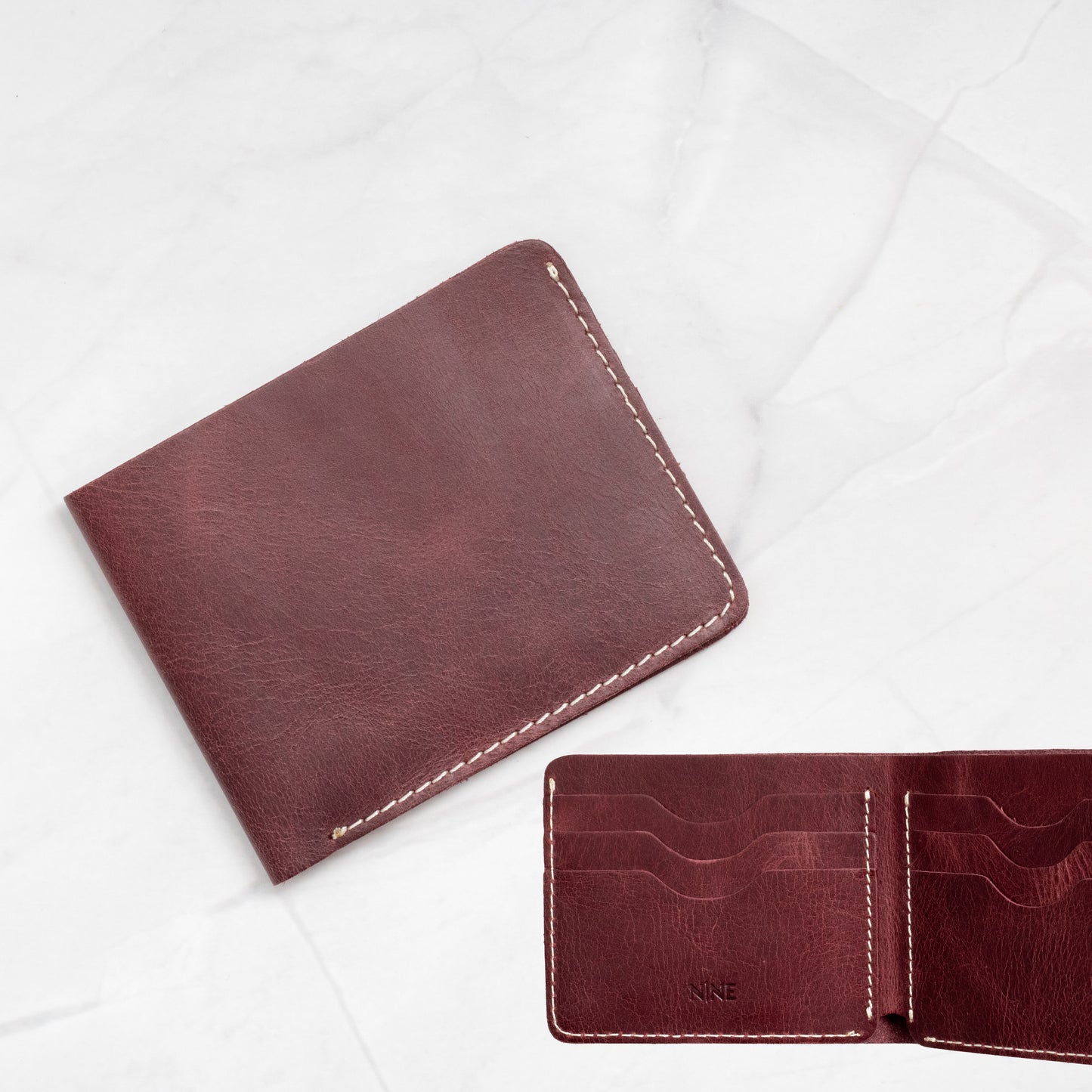 Burgundy Full-Grain Leather Classic Bifold Wallet with a slim profile and 6 card slots.
