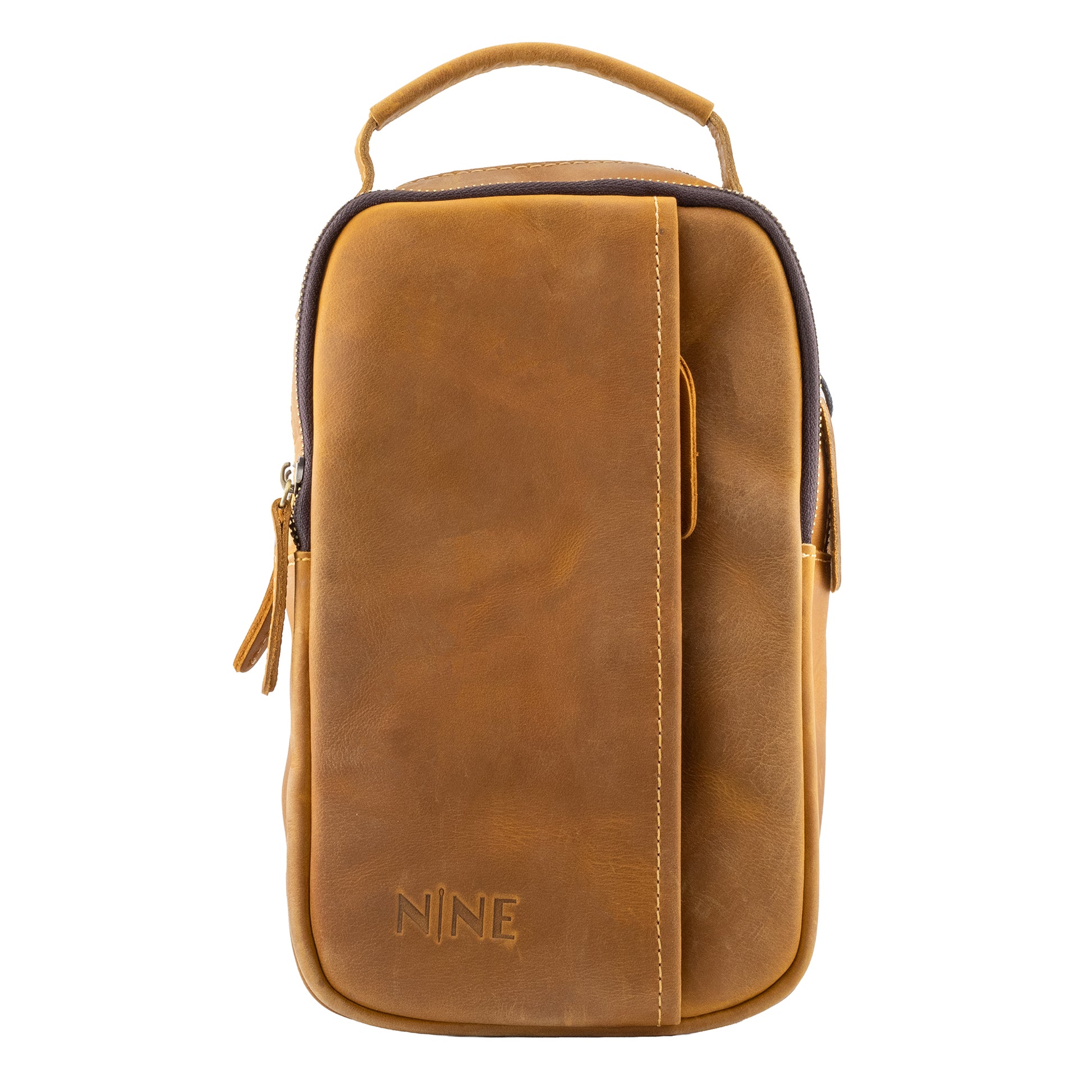 Straight-on front view of the NINE Leather Crazy Horse Sling Bag in tan, highlighting the rugged full-grain leather texture, architectural front pocket design, and embossed logo against a pure white background.