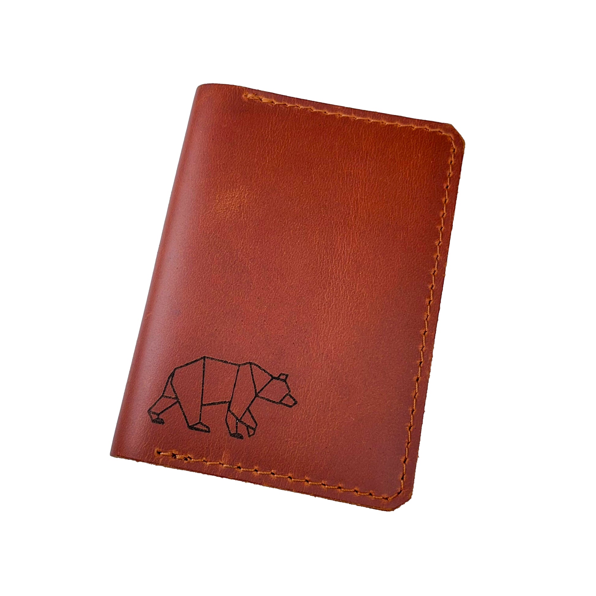 Handcrafted brown leather wallet with a geometric bear design by Nine Leather & Watch.