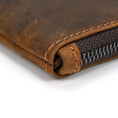 Close-up of a dark brown full-grain crazy horse leather Long Zipper Wallet, showing detailed stitching and a heavy-duty zipper.