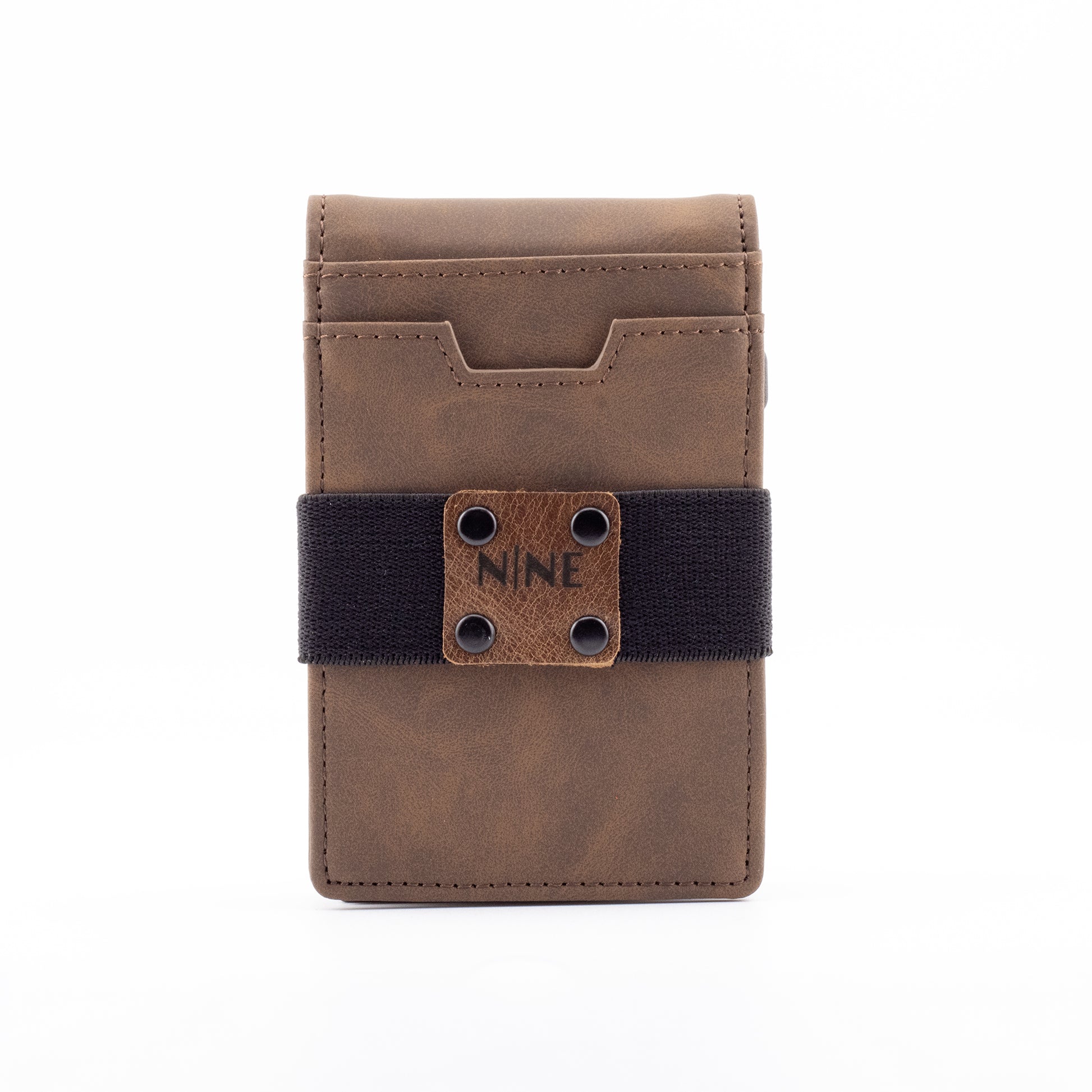 Front straight-on view of the upgraded brown genuine leather magnetic wallet, highlighting the secure black elastic money strap, riveted NINE badge, and premium stitching.