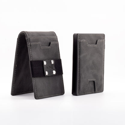 The NINE Leather Magnetic Pop-Up Wallet in gray genuine leather, showing the modular outer sleeve equipped with a black NINE branded money strap next to the slim RFID-blocking core.