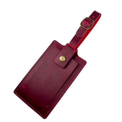 Handcrafted red leather luggage tag with ID window, by Nine Leather & Watch.