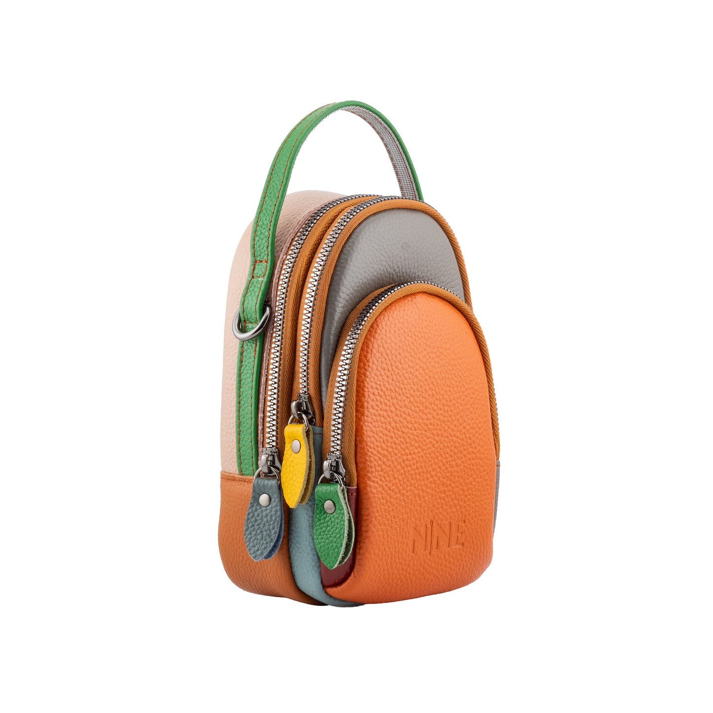 Angled profile of the color-blocked Sling Candy Crossbody bag by NINE Leather, featuring a bold orange pebbled leather front pocket, a gray middle tier, and a vibrant green handle, isolated on a white background.