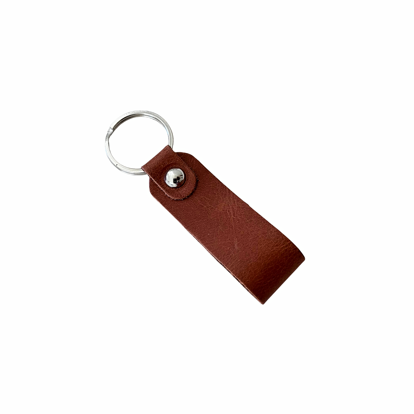 Handcrafted brown leather keychain with metal ring and snap closure, made in the USA by Nine Leather & Watch.