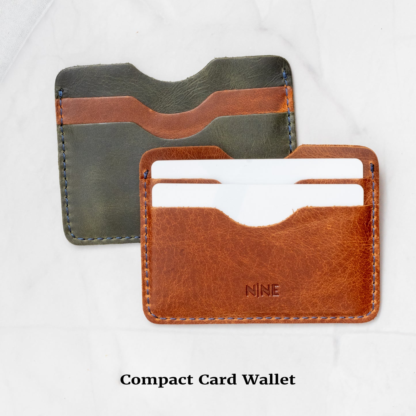 Two Compact Card Wallets illustrating two-tone color options (Brown/Tan and Dark Green/Tan) for DIY workshop participants.