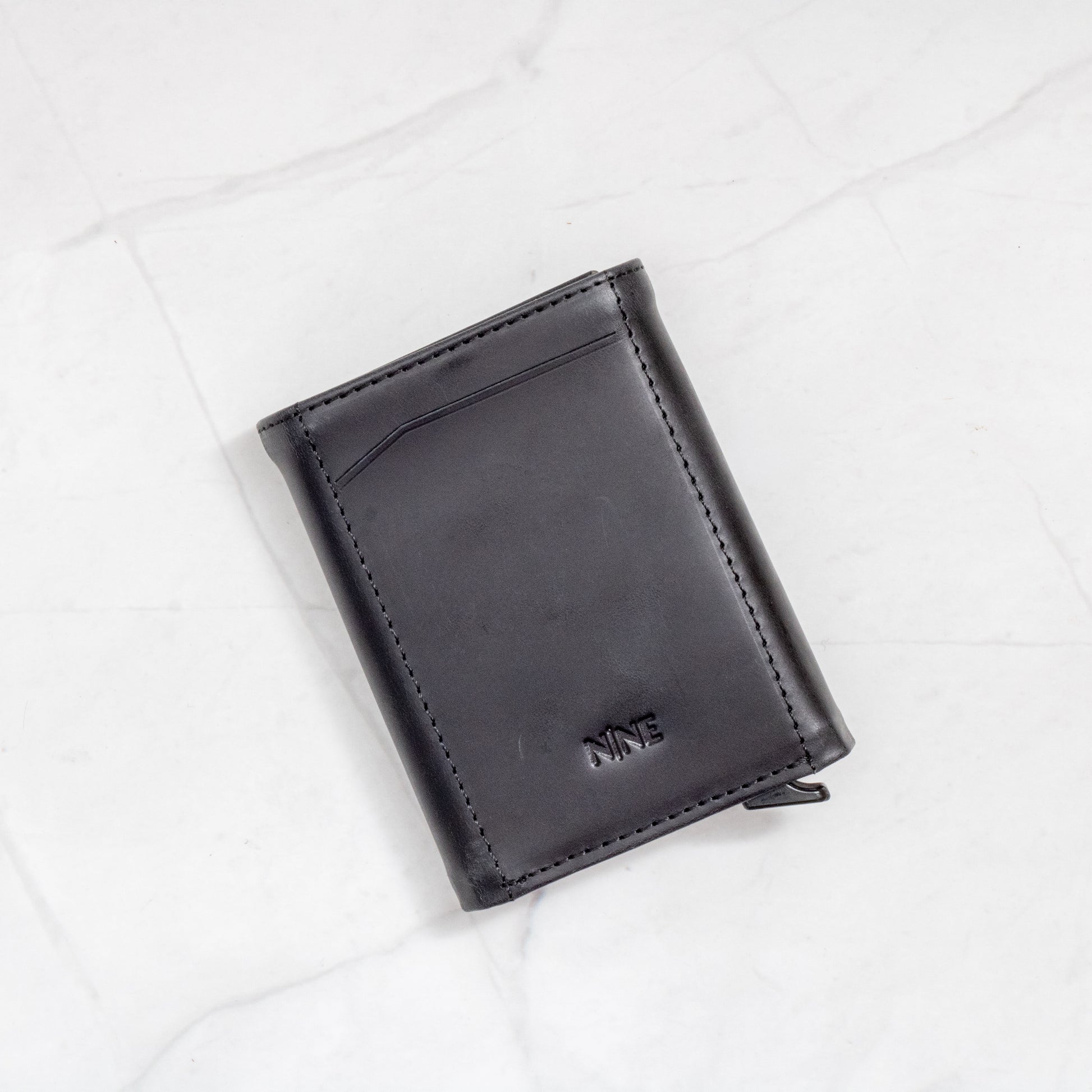 Black Full-Grain Leather Trifold Pop-Up Wallet with quick-view ID window and snap closure