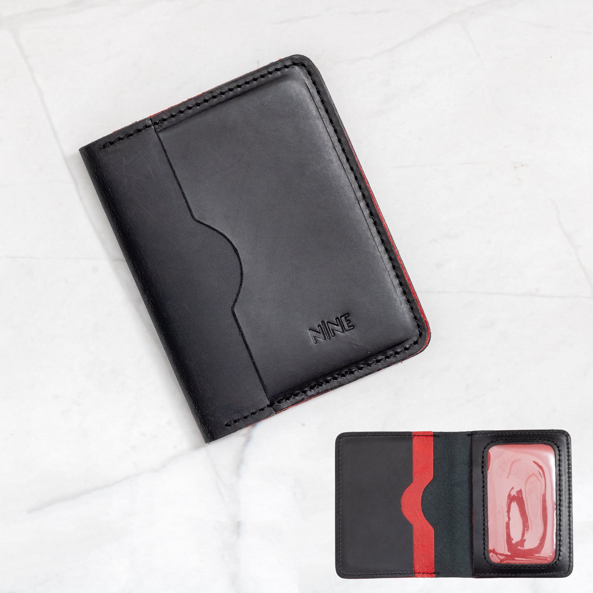 Black and Red two-tone Full-Grain Leather Bifold ID Wallet showing interior color contrast and ID window.
