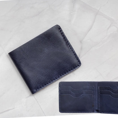 Blue Full-Grain Leather Classic Bifold Wallet with a slim profile and 6 card slots.