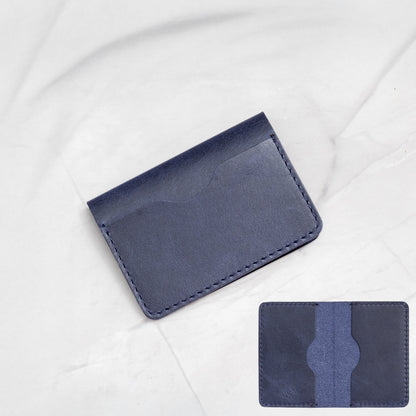 Blue Full-Grain Leather Minimalist Bifold Card Wallet with a slim, simple, and durable design.