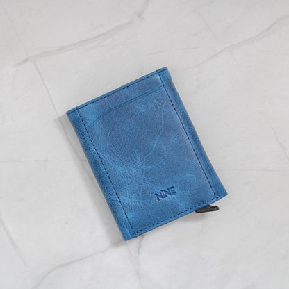 Blue Full-Grain Leather Trifold Pop-Up Wallet with quick-view ID window and snap closure