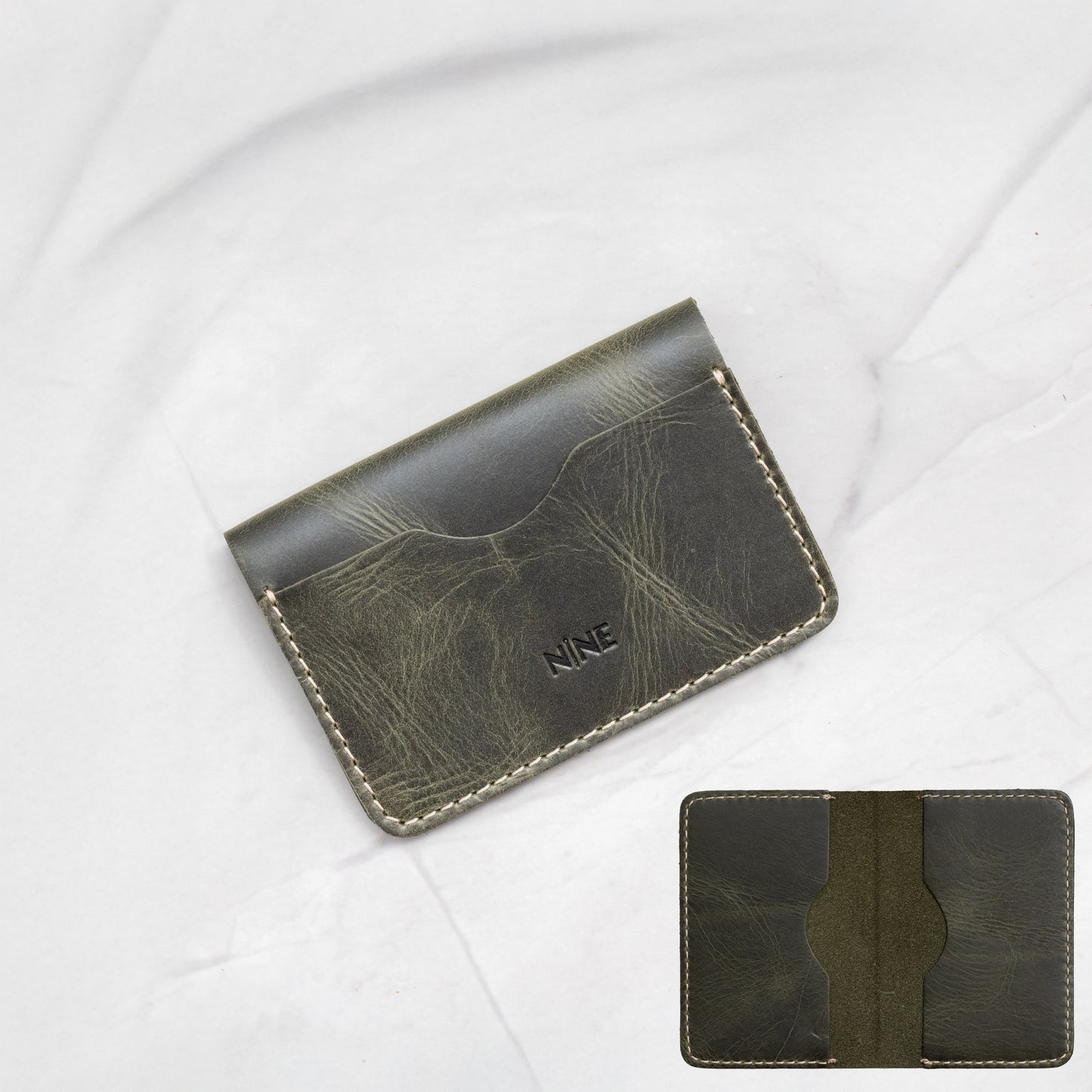 Olive Green Full-Grain Leather Minimalist Bifold Card Wallet, showing the small, compact size.