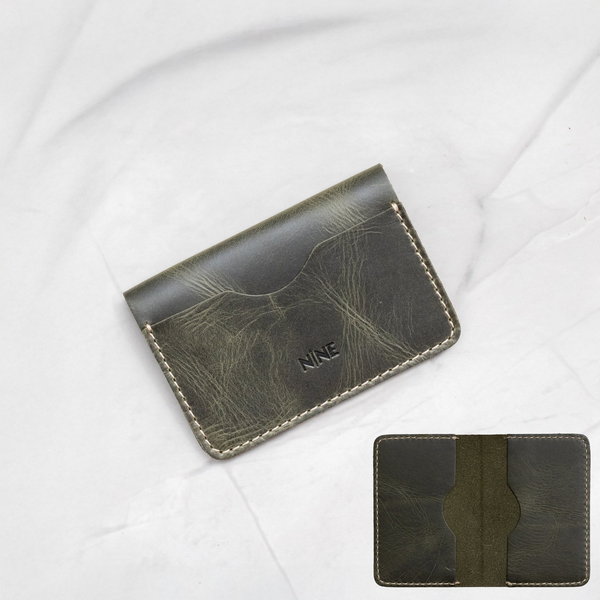 Olive Green Full-Grain Leather Minimalist Bifold Card Wallet, showing the small, compact size.