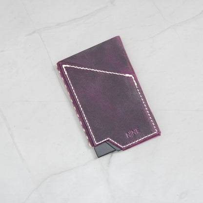 Purple Full-Grain Leather NINE Pop-Up Card Wallet with white contrast stitching