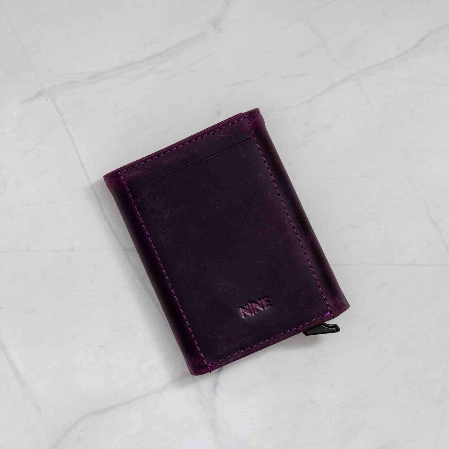 Purple Full-Grain Leather Trifold Pop-Up Wallet with quick-view ID window and snap closure