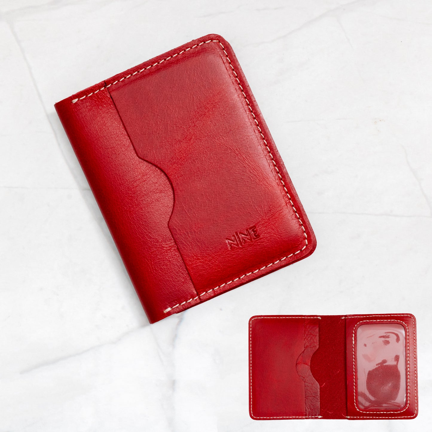 Red Full-Grain Leather Bifold ID Wallet with white contrast stitching and interior quick-view ID sleeve.