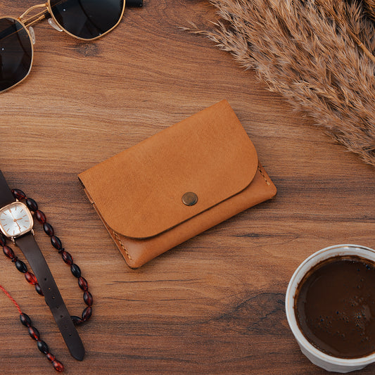 snap wallet on a table with other prompts like coffee, watch, sunglasses, etc
